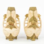 Royal Dux, a pair of vases made of faience in art nouveau style. (H:21,5 x D:12 cm)