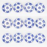 Cappellemans Brussel, 12 plates made of blue-white glazed faience. (H:2,5 x D:23,5 cm)