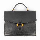 Delvaux, a suitcase made of black leather with gold-plated elements. (W:39 x H:33 cm)