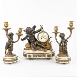 A three-piece mantle garniture, consisting of a clock with 2 candelabra. 19th C. (W:37 x H:39 cm)
