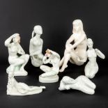 A collection of 7 ceramic figurines of naked ladies (H:25 cm)