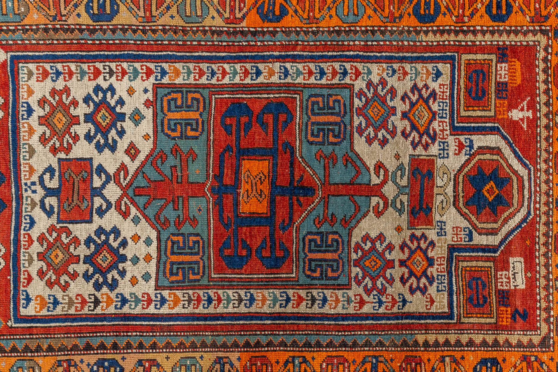 An oriental hand-made carpet. Kazak Caucasian. (L:175 x W:122 cm) - Image 3 of 9