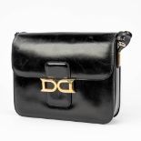 Delvaux, model Bourgogne a vintage handbag made of black leather with gold-plated hardware. (W:26 x