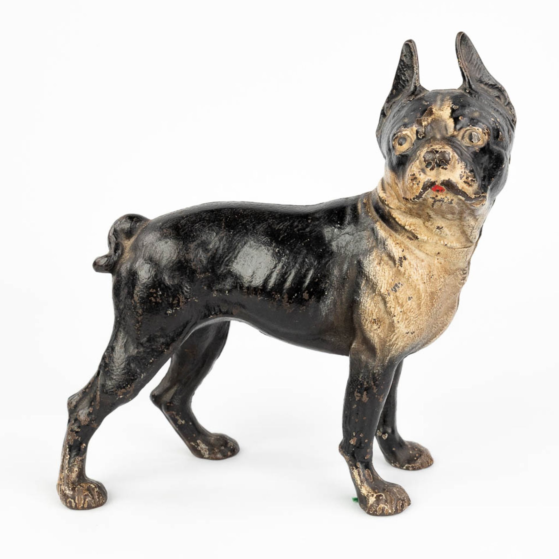 An antique figurative door stopper in the shape of a dog, cast iron. (W:25,5 x H:26 cm)