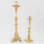 A collection of 2 candelabra made of polished bronze. (H:65 cm)