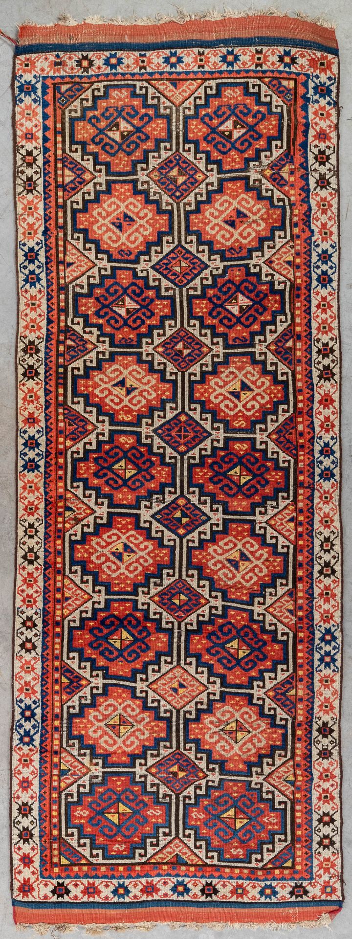 An oriental hand-made carpet. Kazak Caucasian. (L:315 x W:104 cm)