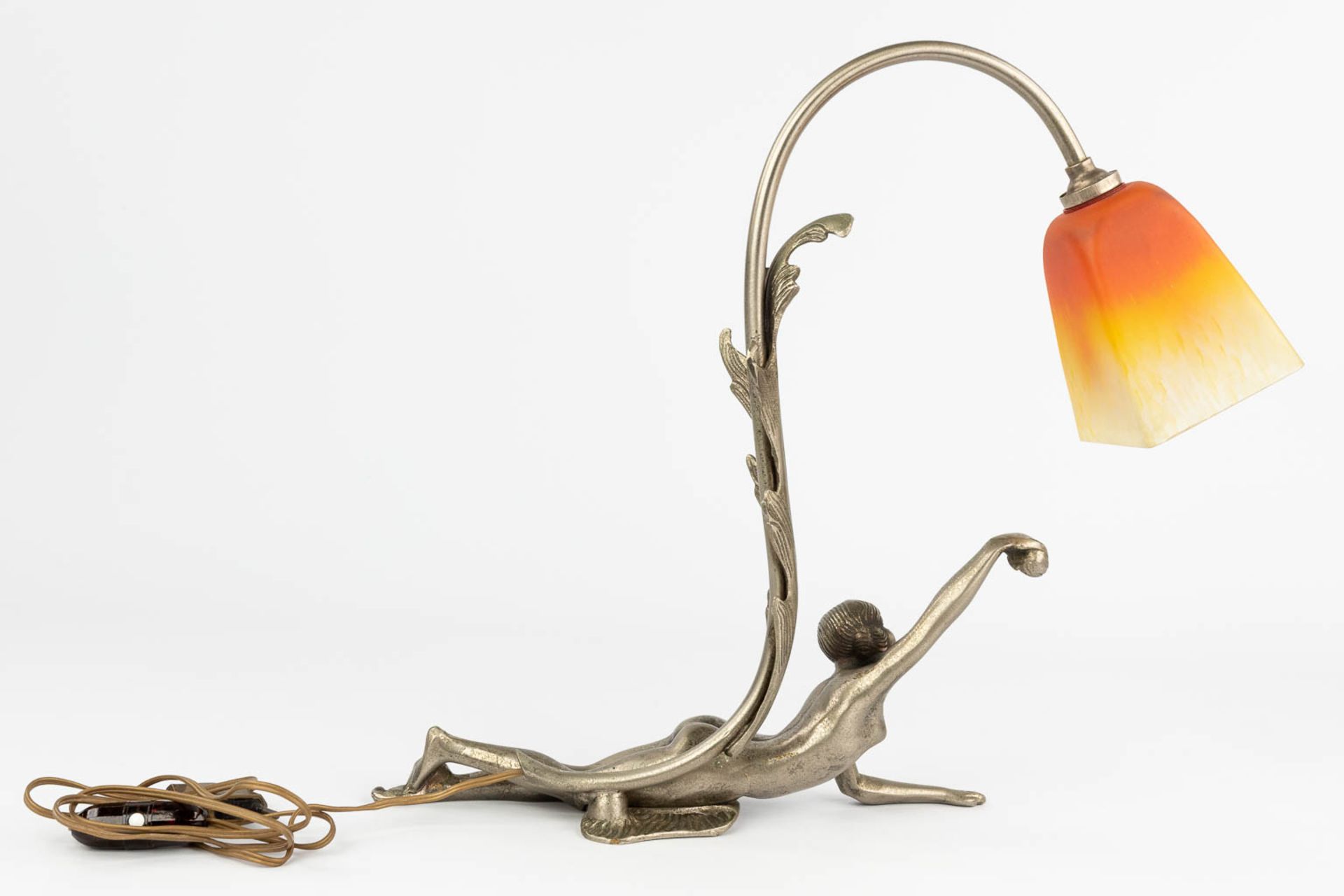 A silver-plated bronze table lamp with reclining lady, and a pate de verre lampshade by Schneider. ( - Image 10 of 13