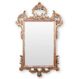 An Italian wood sculptured mirror in Rococo style. Circa 1970. (W:49 x H:115 cm)