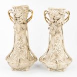 Royal Dux, a pair of vases made of faience in art nouveau style with floral decors. (L:24 x W:28 x