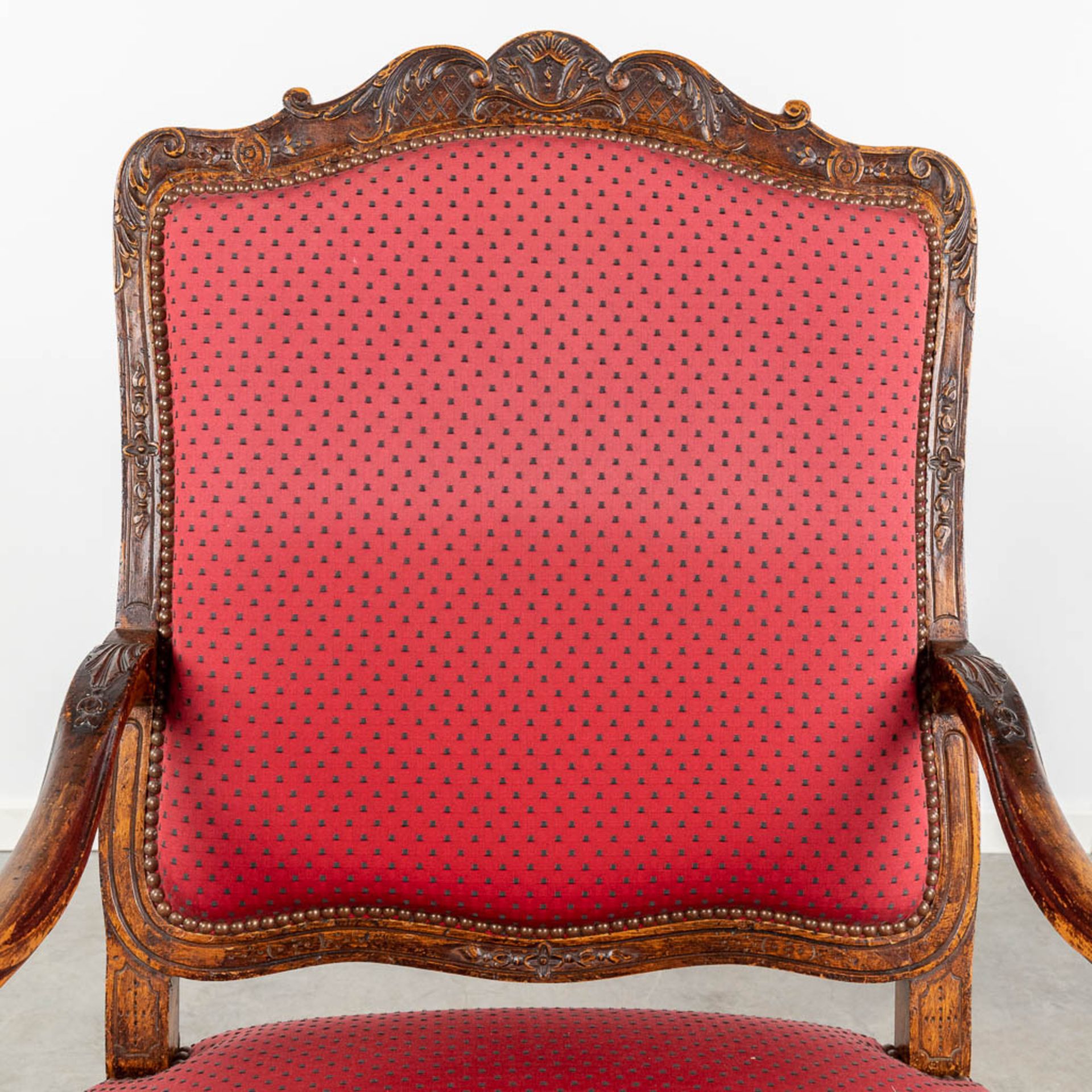 An armchair finished with red fabric and wood sculptures in Louis XV style. (L:73 x W:72 x H:108 cm - Image 13 of 13