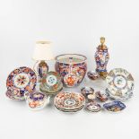 A collection of 30 pieces of porcelain and faience and porcelain, made in Japan, Imari. (H:25,5 x D: