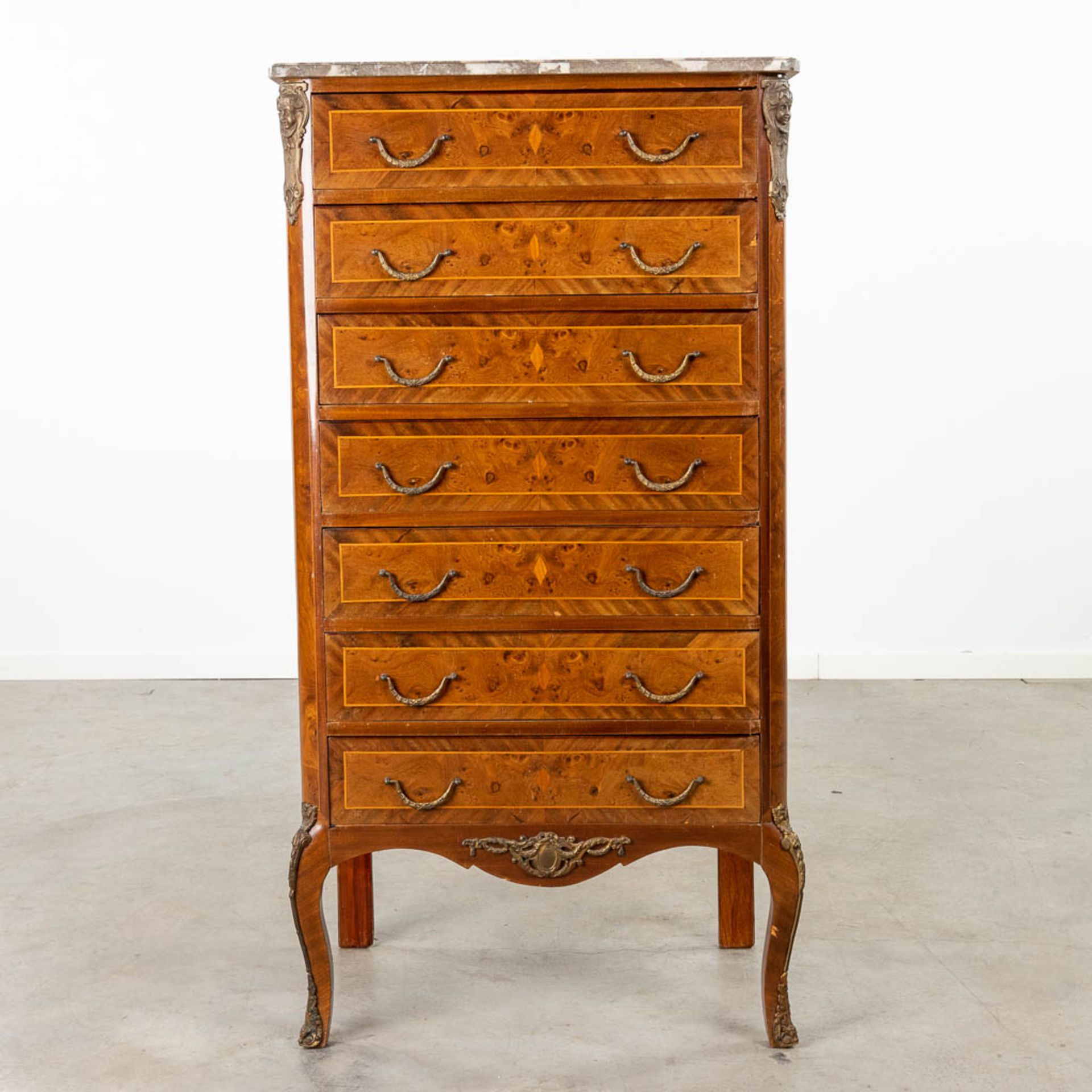 A 7 drawer cabinet finished with marquetry inlay and a marble top. Circa 1970. (L:43 x W:77 x H:135