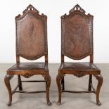 A pair of chairs with high back finished with Cordoba leather. (L:50 x W:56 x H:126 cm)