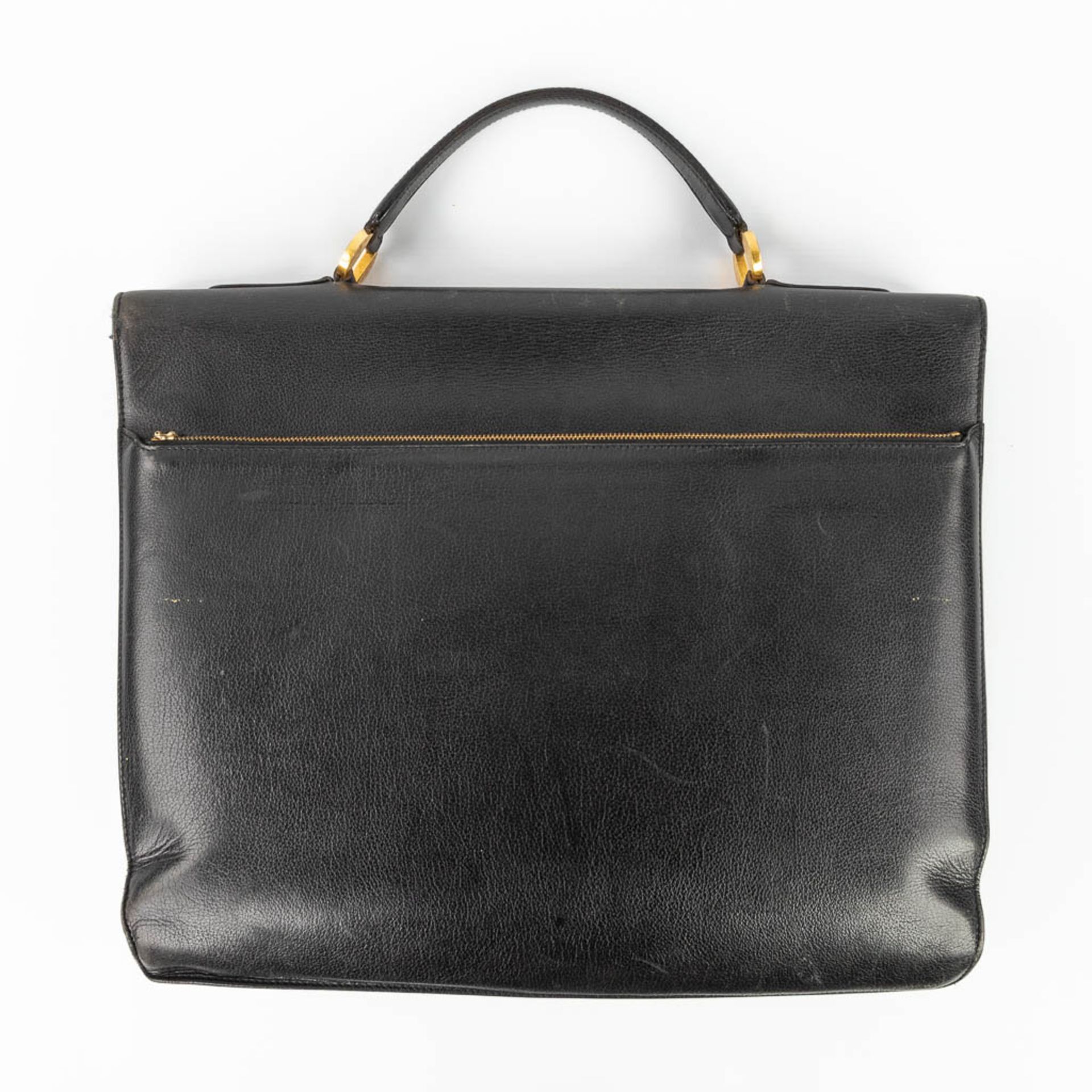 Delvaux, a suitcase made of black leather with gold-plated elements. (W:39 x H:33 cm) - Image 13 of 16