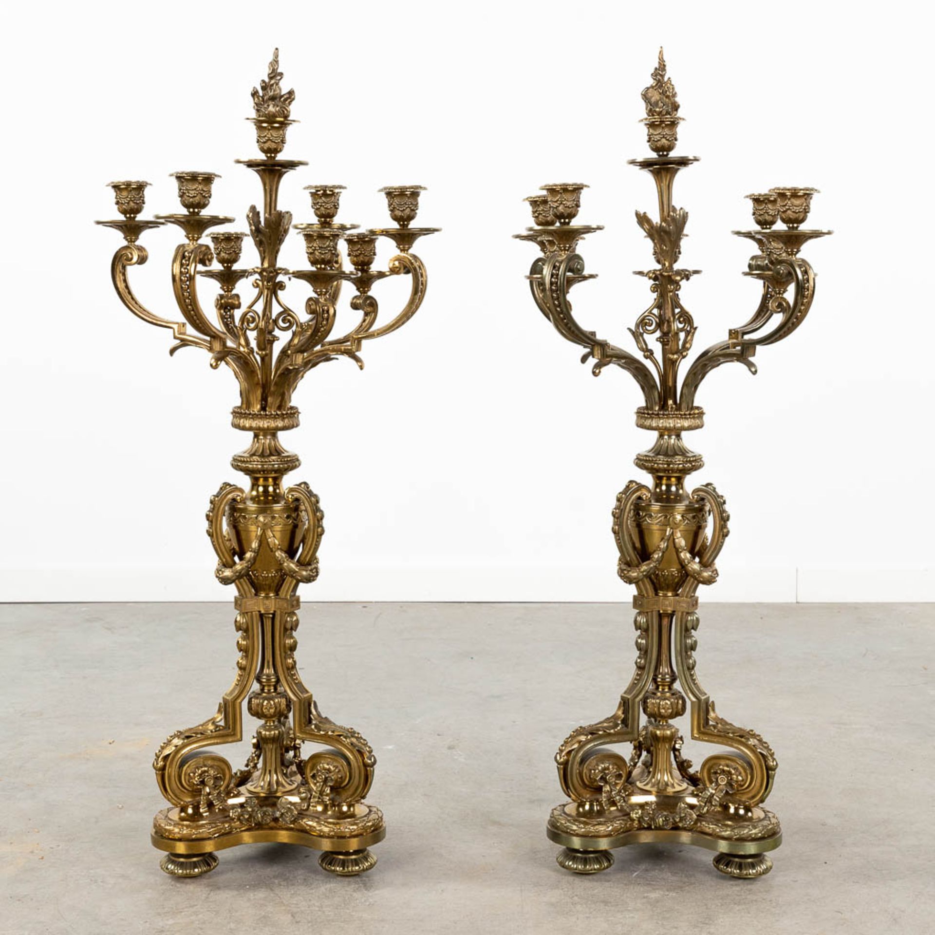 A pair of large neoclassical candelabra made of polished bronze. (L:30 x W:30 x H:90 x D:42,5 cm) - Image 4 of 12