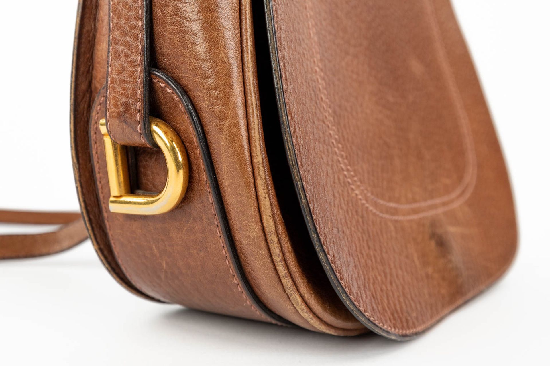 Delvaux, a cross-body handbag made of brown leather. (W:26 x H:22 cm) - Image 11 of 16