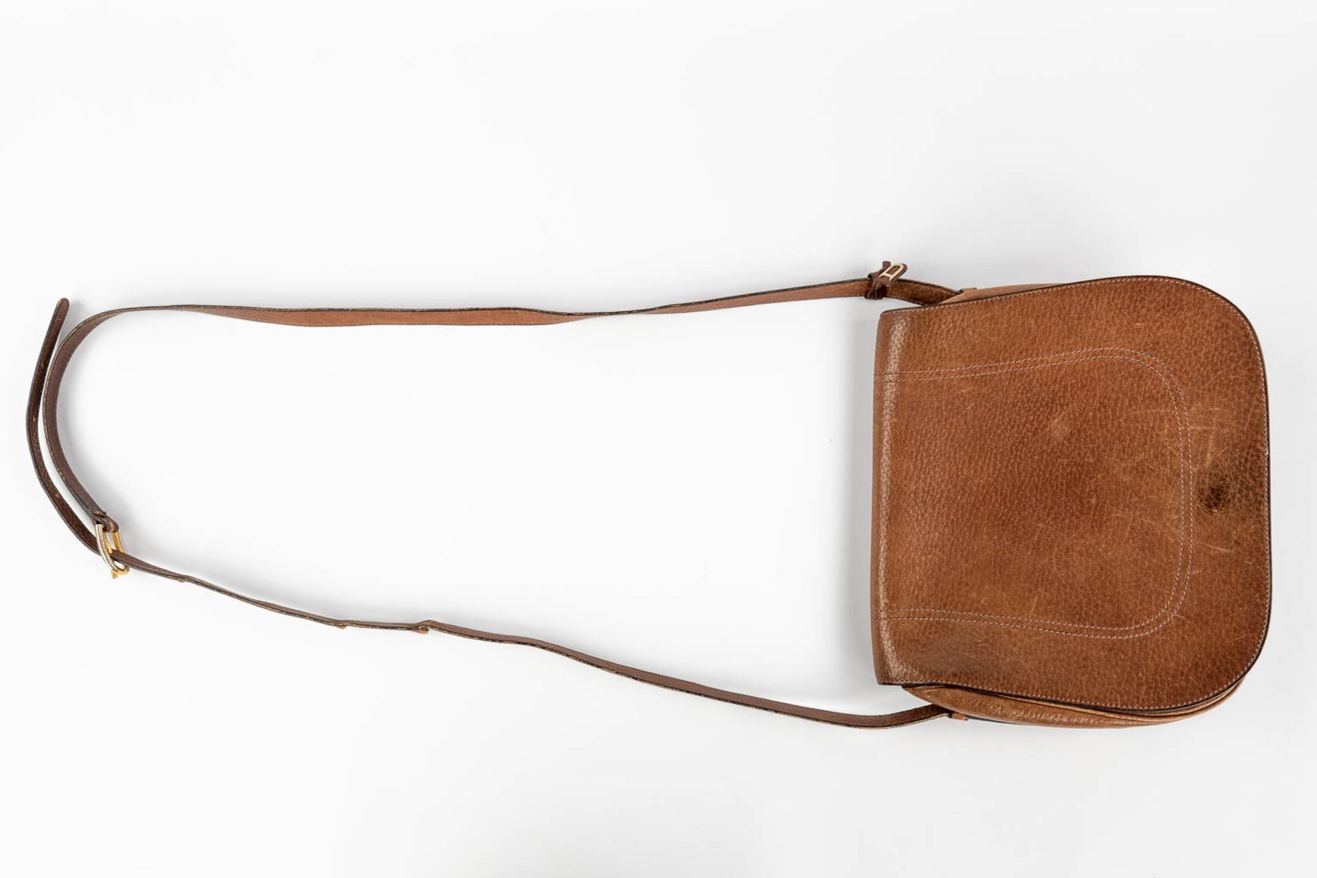 Delvaux, a cross-body handbag made of brown leather. (W:26 x H:22 cm) - Image 2 of 16