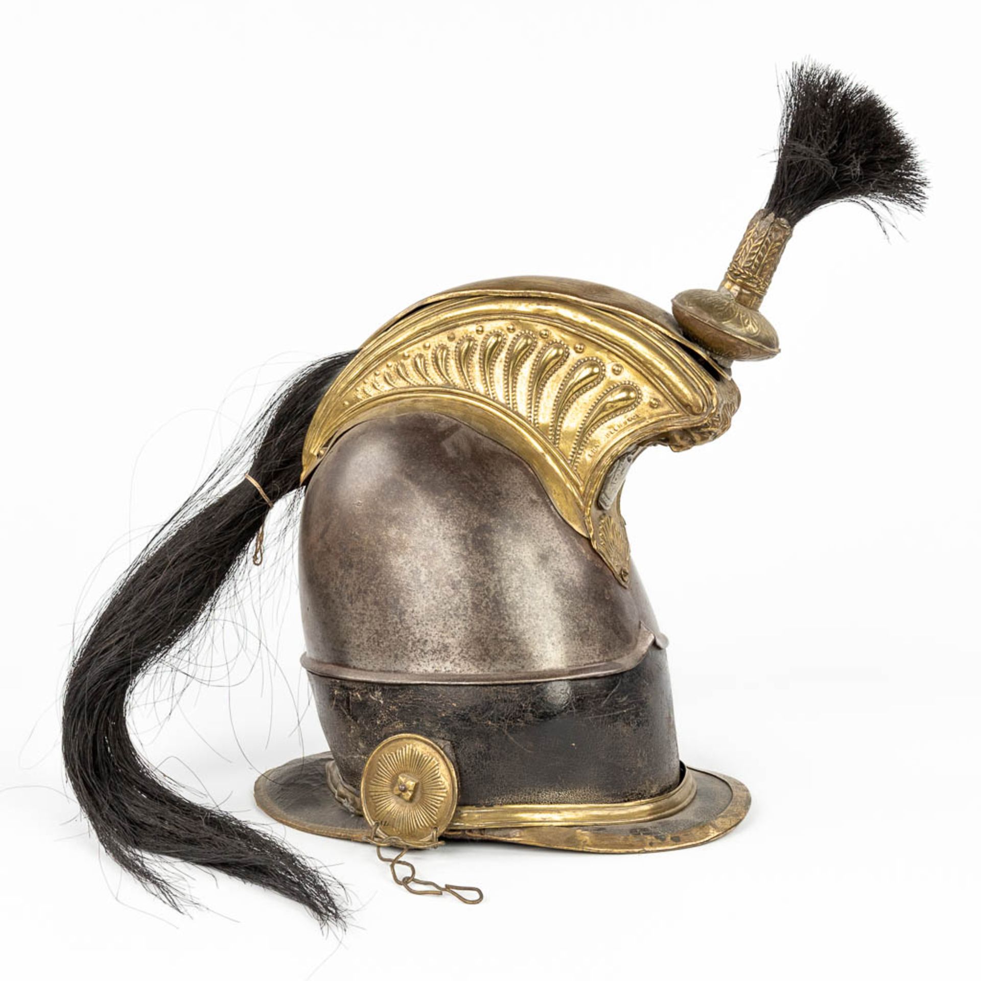 A Belgian 'Cruissasier' helmet, marked Fabrication Lige, 1831. (L:36 x W:20 x H:39 cm)