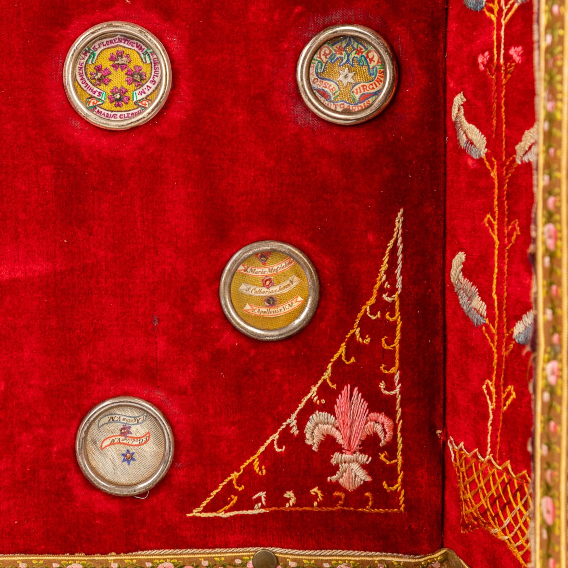 An antique reliquary box with relics a relic crucifix and embroidery. (L:13 x W:52 x H:75 cm) - Image 11 of 23