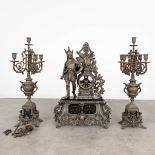 A three-piece mantle garniture clock with an 'Ambiorix' figurine, made of spelter. (L:19 x W:49 x H