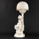 A vintage table lamp, made of sculptured alabaster. Made in Italy, 20th century. (H:71 cm)