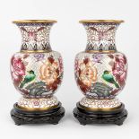 A pair of cloisonnŽ vases with flower and bird decor, in the original box. (H:31 x D:19 cm) (H:31