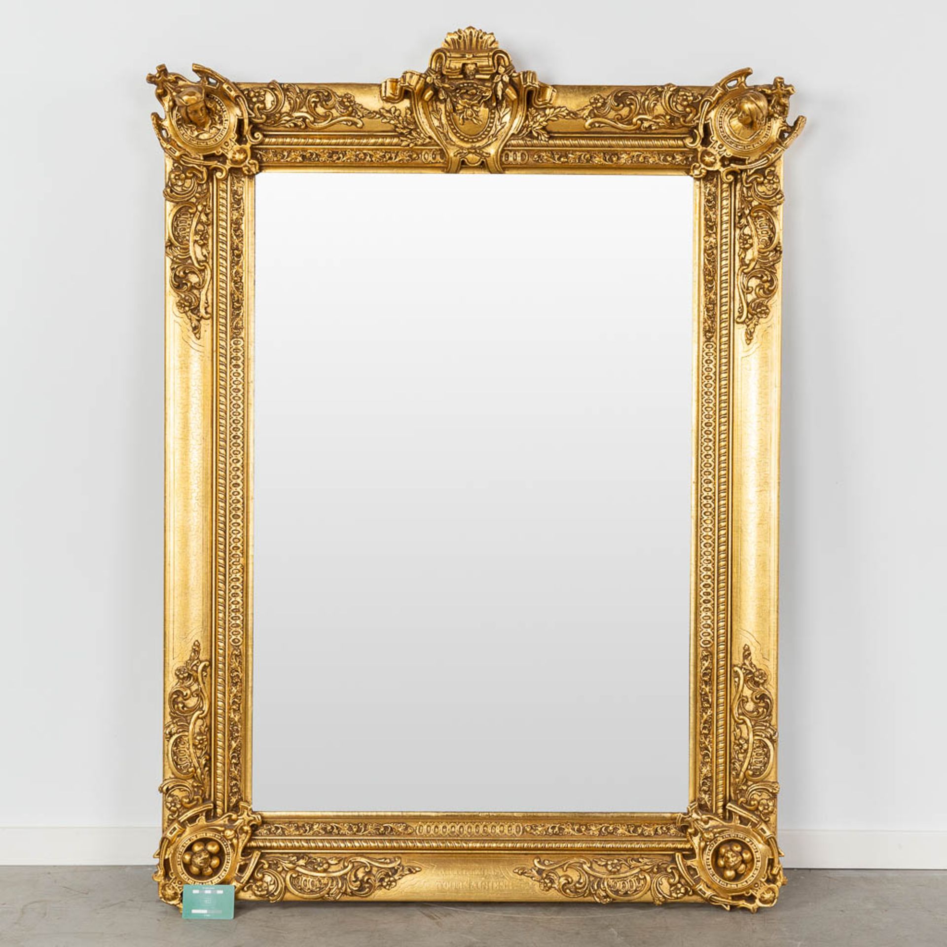 A gold-plated mirror, made of wood an stucco. 20th C. (W:104 x H:145 cm) - Image 2 of 9