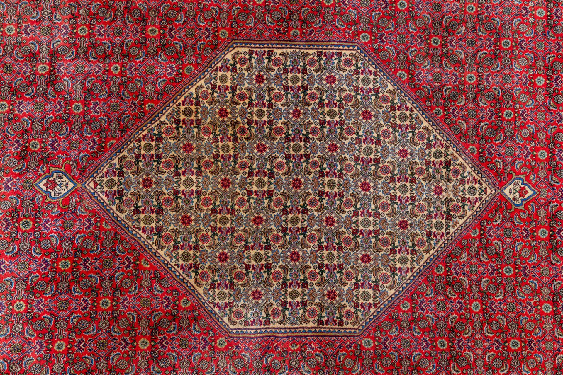 An oriental hand-made carpet, Bidjar. (L:339 x W:232 cm) - Image 8 of 8