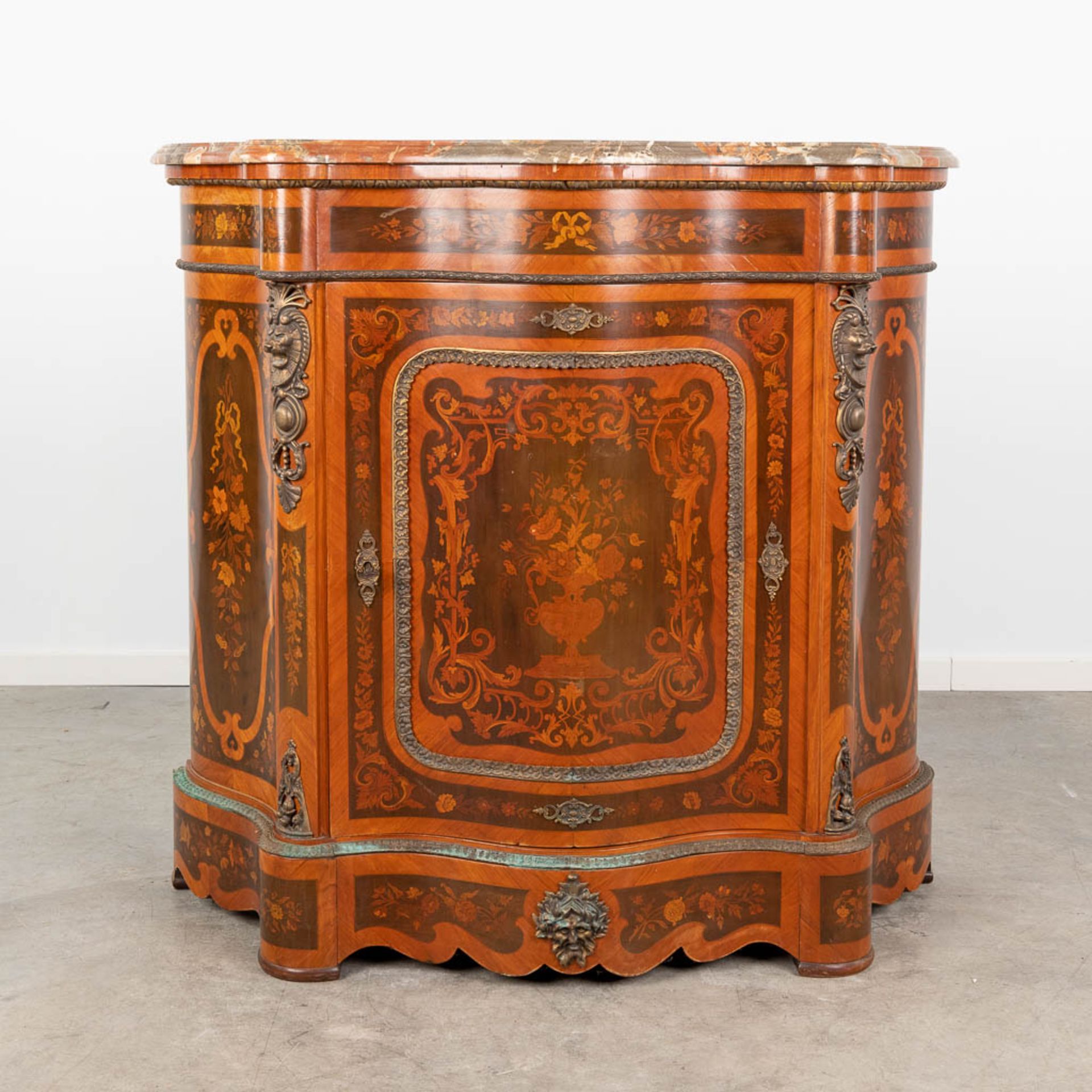 A one door commode, decorated with marquetry inlay and mounted with bronze. 20th century. (L:47 x W