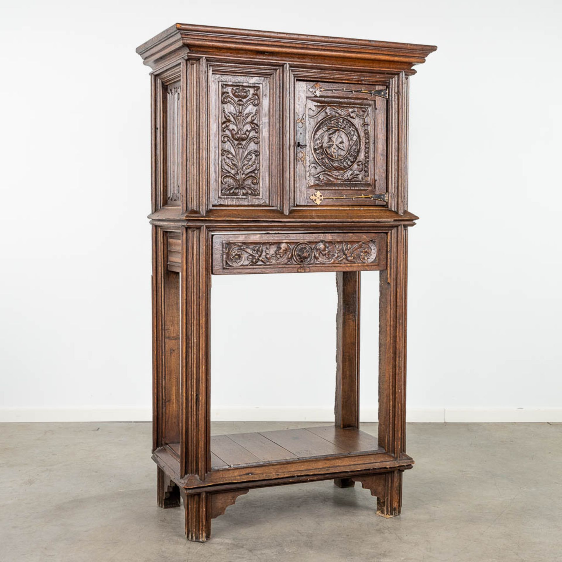 An antique cabinet 'Flemish Renaissance' mounted with bronze and decorated with figurines and floral