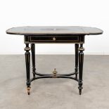 A game table made of ebonised wood inlaid with marquetry and mounted with bronze in Napoleon 3 style