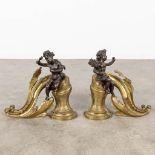 A pair of fireplace bucks decorated with putti in Louis XV style. 19th C. (W:33 x H:30 cm)