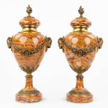 A pair of marble cassolettes mounted with bronze in Louis XVI style. (L:18 x W:21 x H:45 cm)