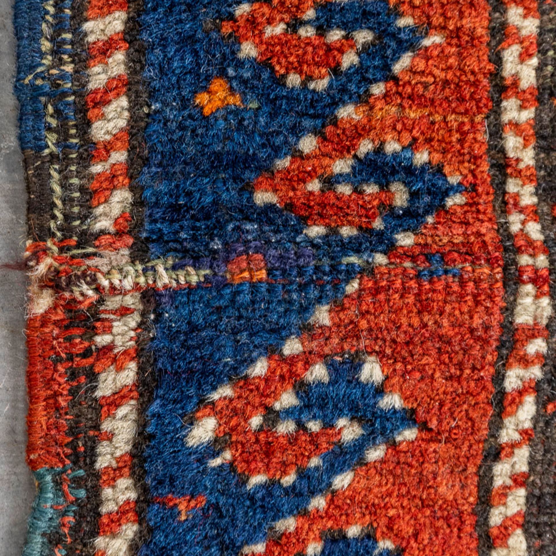 An oriental hand-made carpet. Kazak Caucasian. (L:175 x W:122 cm) - Image 7 of 9