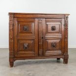 An antique two-door cabinet, decorated with sculptured lion's heads. 18th C. (L:42 x W:111 x H:95 c