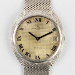 Baume Et Mercier 'Baumatic', a men's wristwatch made of 18-karat white gold. 59,26g (D:3,5 cm)