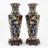 A pair of sextagonal CloisonnŽ vases decorated with fauna and flora. (L:14 x W:14 x H:39 cm)