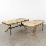 A collection of 2 coffee tables made of brass with an onyx table top. (L:54 x W:120 x H:47 cm)