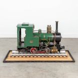 A working 'Steam Train' model, on a train track. In working condition (L:56 x W:23 x H:42 cm)