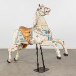 An antique horse for a Merry Go Round, made of sculptured wood, with original polychrome (L:32 x W:1