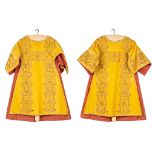 An identical pair of Dalmatics with embroidered thick gold thread and decorated with floral motives.