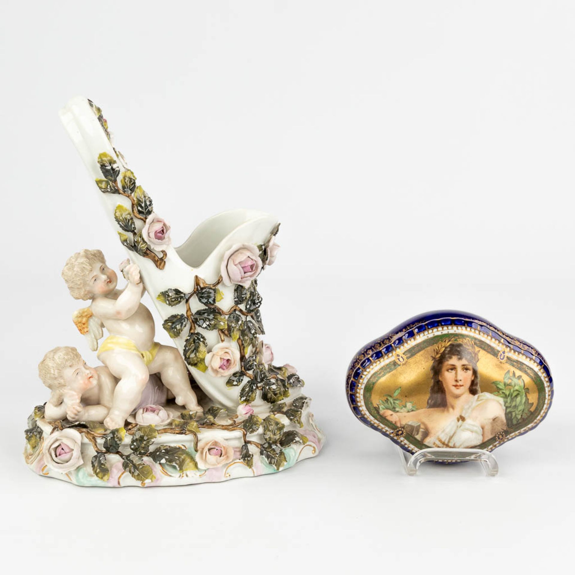 Sitzendorf & 'Royal Vienna' a set of 2 porcelain items. (L:12 x W:20 x H:23 cm)