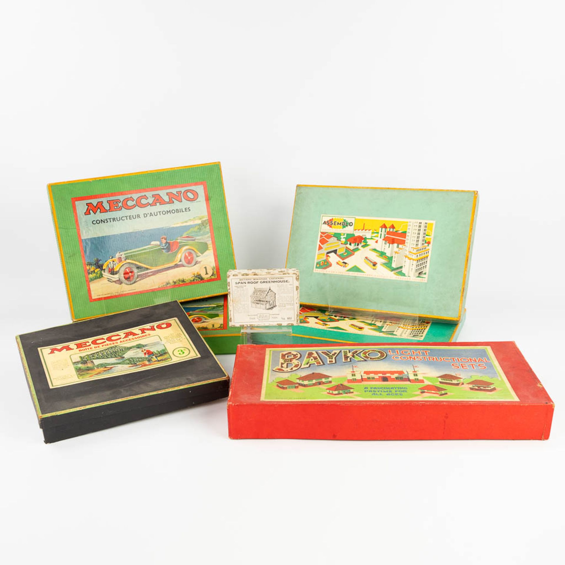 Meccano, Bayco and Assemblo, a collection 4 boxes of mid-century toys. Circa 1960. (L:30 x W:39 x H