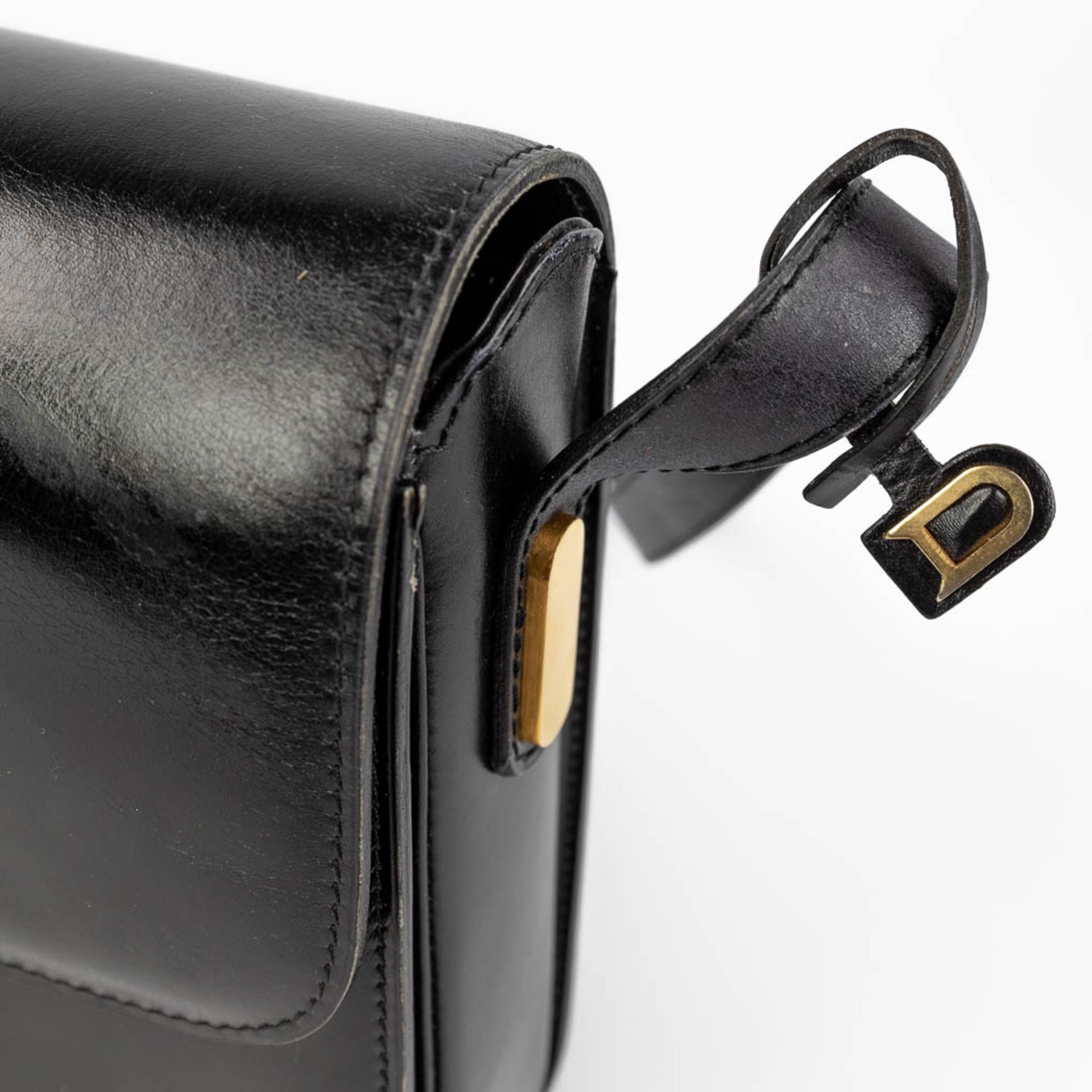 Delvaux, model Bourgogne a vintage handbag made of black leather with gold-plated hardware. (W:26 x - Image 6 of 17