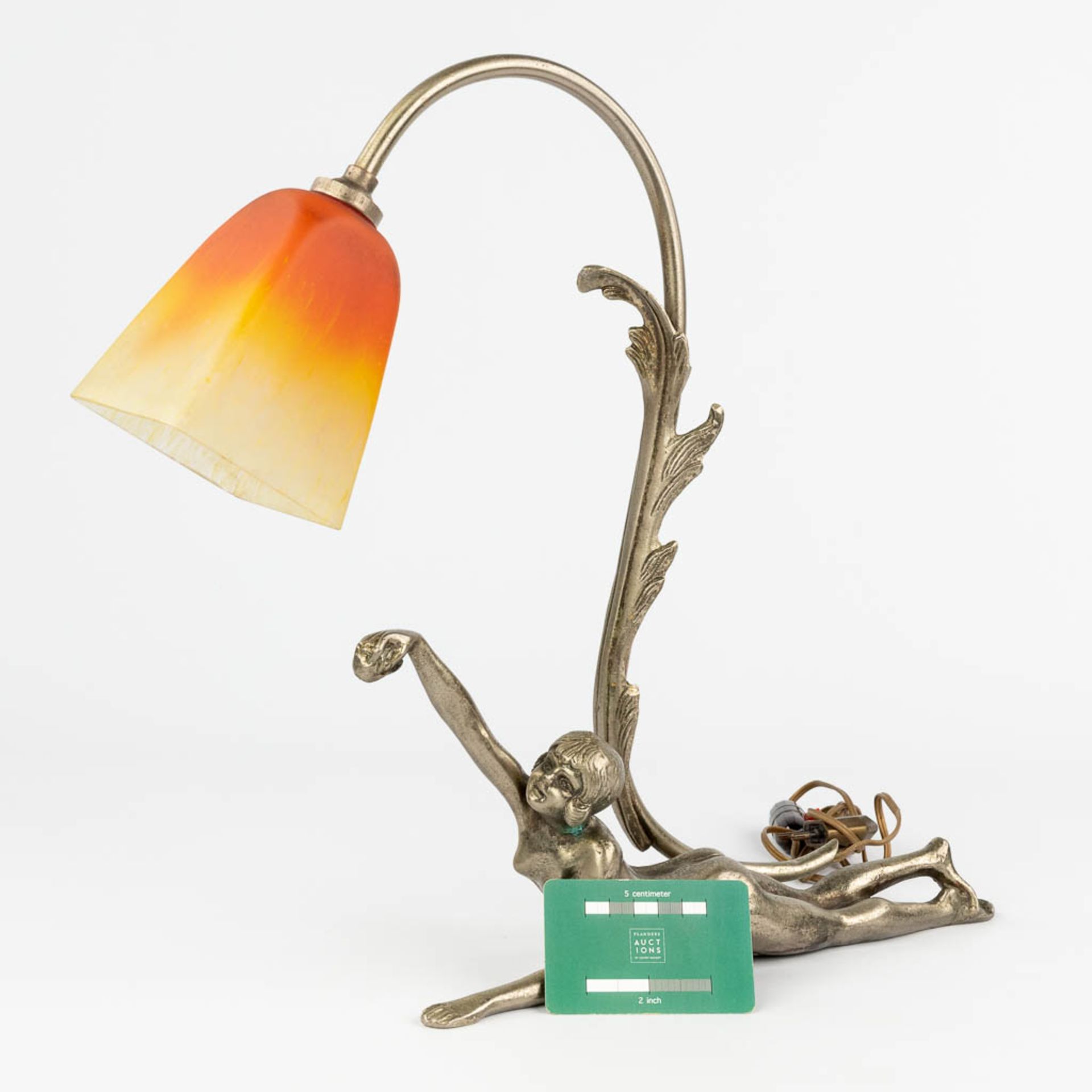A silver-plated bronze table lamp with reclining lady, and a pate de verre lampshade by Schneider. ( - Image 3 of 13