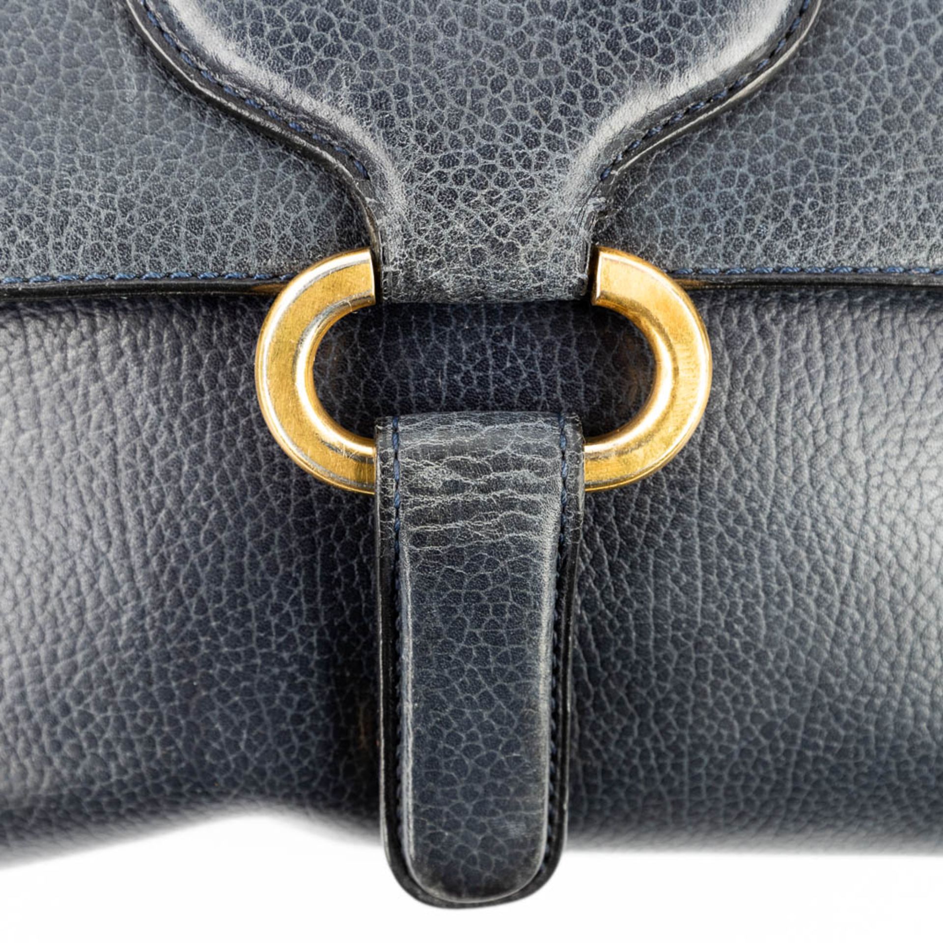 Delvaux, a handbag made of blue leather with gold-plated elements. (W:27 x H:22 cm) - Image 8 of 19