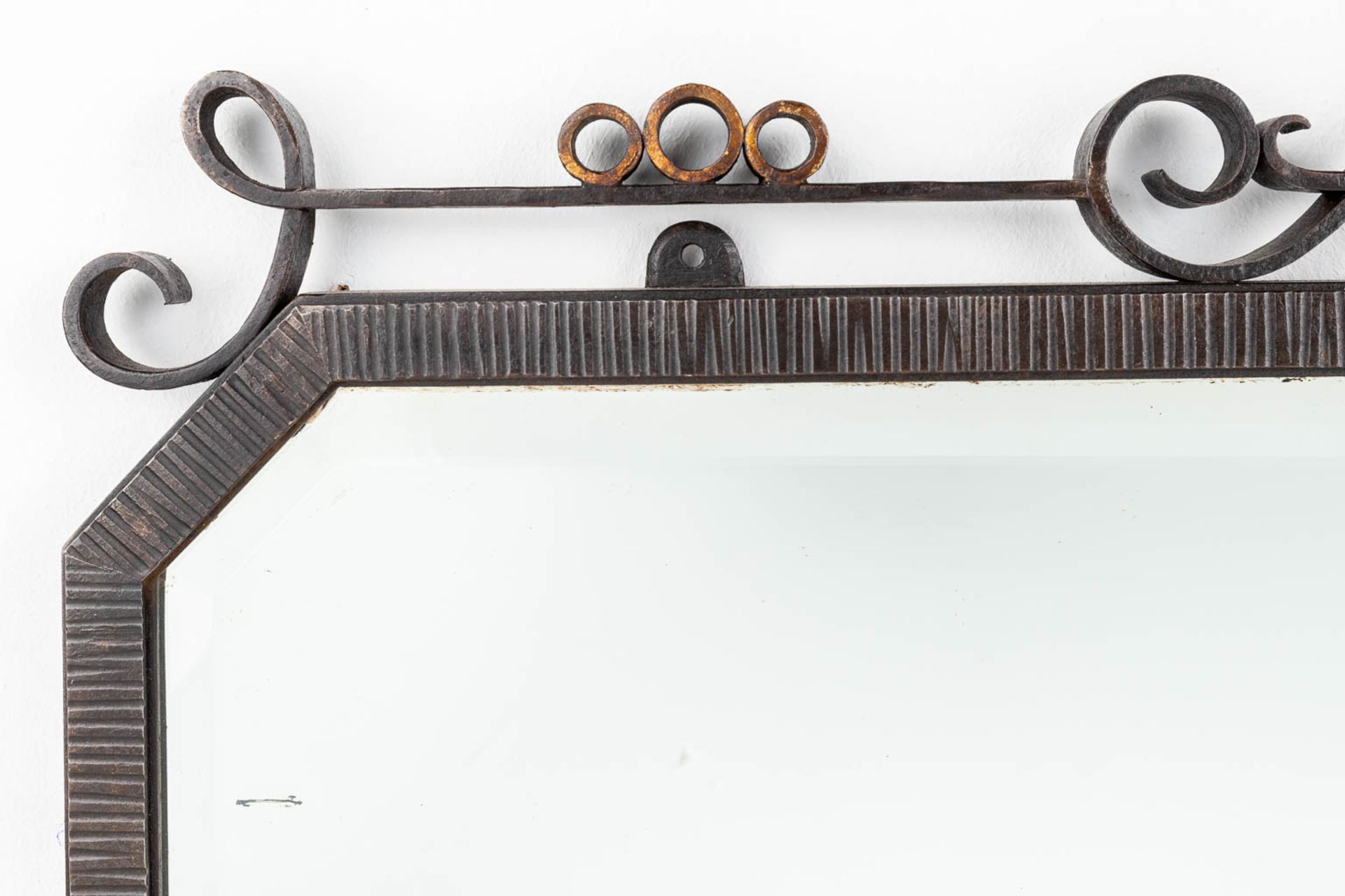 A mirror with a wrought iron frame, circa 1920. (W:80 x H:60 cm) - Image 7 of 7
