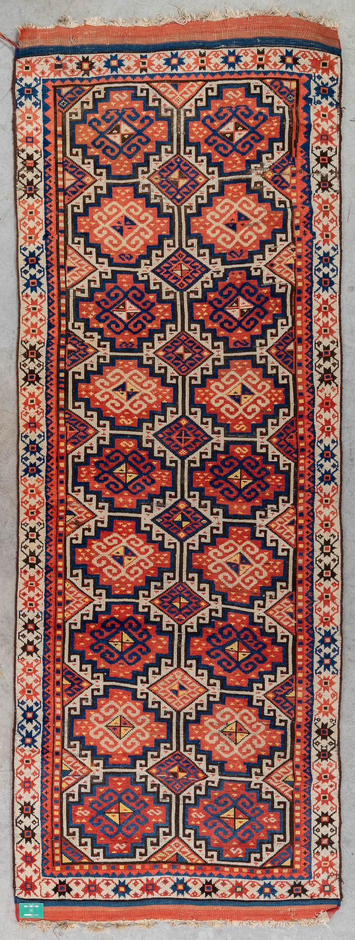 An oriental hand-made carpet. Kazak Caucasian. (L:315 x W:104 cm) - Image 2 of 9