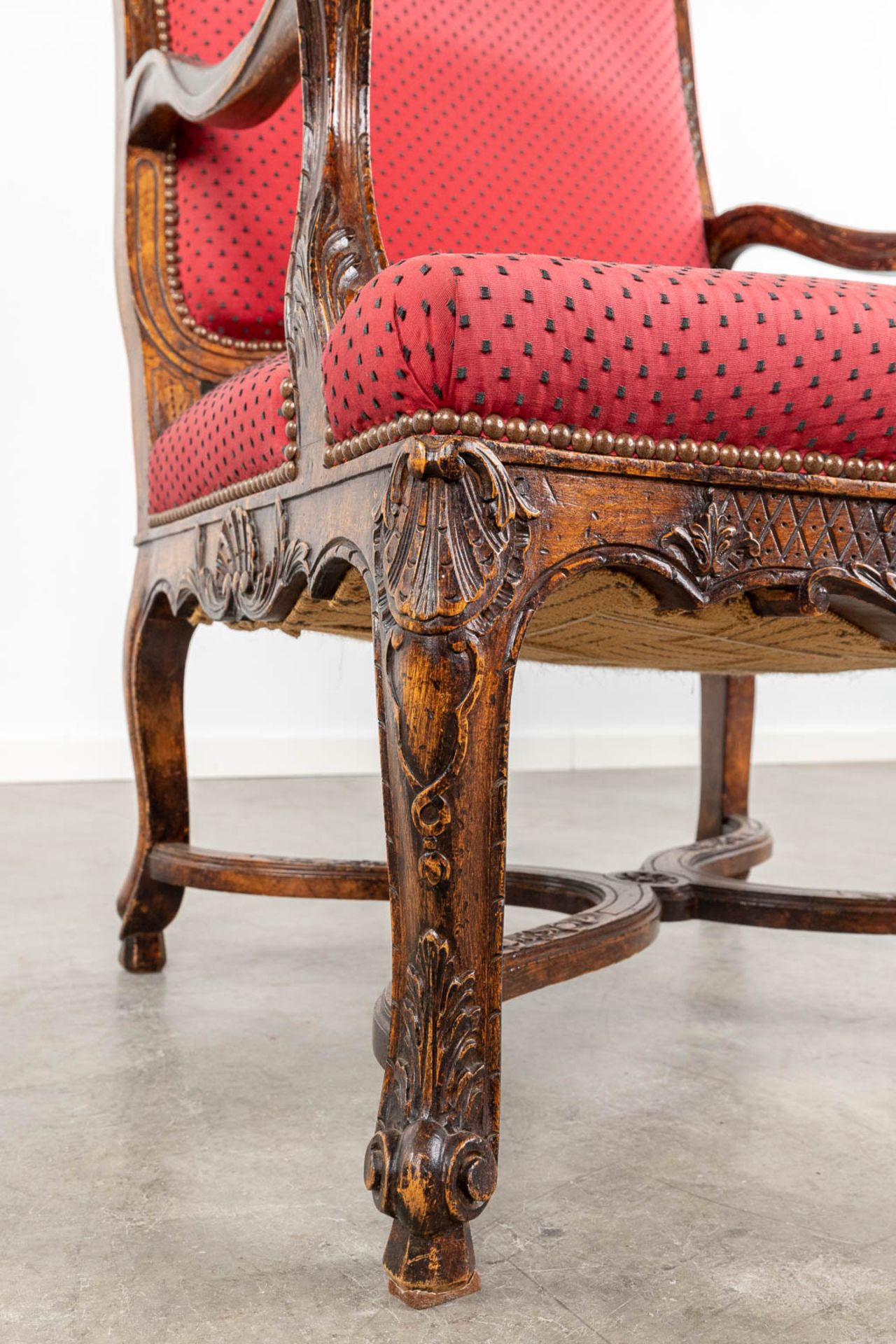 An armchair finished with red fabric and wood sculptures in Louis XV style. (L:73 x W:72 x H:108 cm - Image 9 of 13