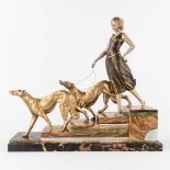 Walking the greyhounds down the stairs', a statue made in art deco style. Spelter and marble. (L:1